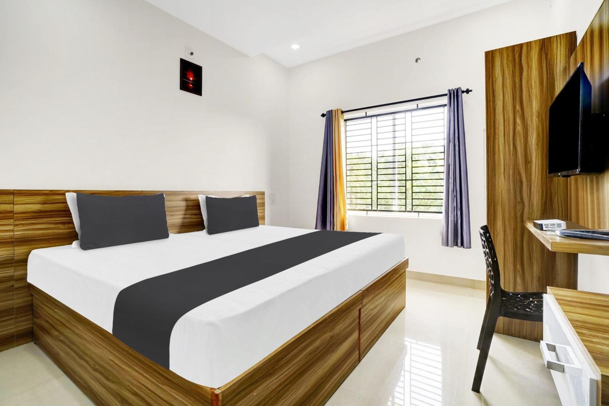 Hotel O Grand Parassini Pāppinisseri المظهر الخارجي الصورة